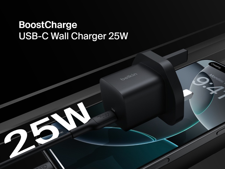Belkin BoostCharge USB-C Wall Charger 25W shown plugged into a smartphone, highlighting its compact design and fast charging capability.