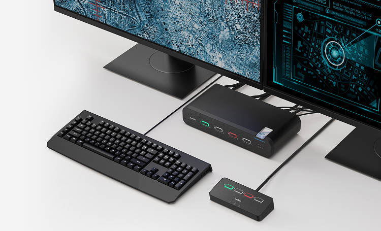 A Belkin Universal DisplayPort Secure KVM device connected to two monitors, a keyboard, and an external switch, enabling secure switching between two computer systems.