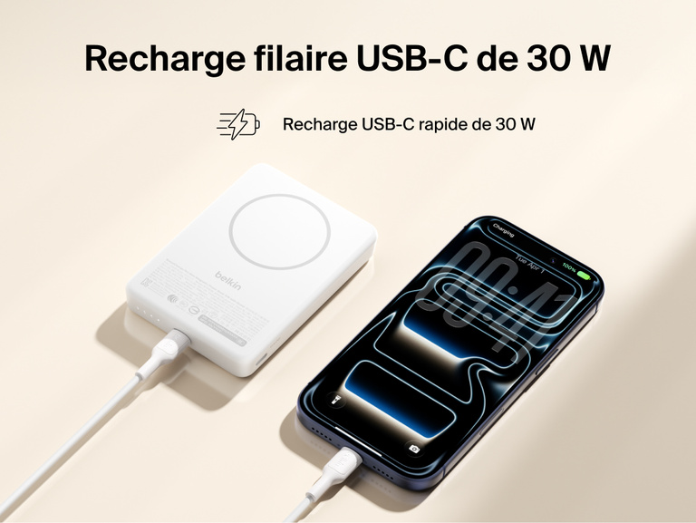 Slim Magnetic Power Bank 10K with Qi2 connected via USB-C cable delivering fast charging to smartphone