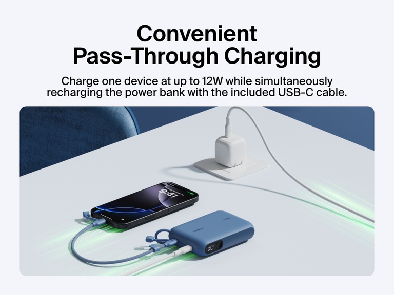 Belkin BoostCharge Power Bank 10K with Display shown delivering pass-through charging, powering a smartphone at up to 12W while recharging via the included USB-C cable.