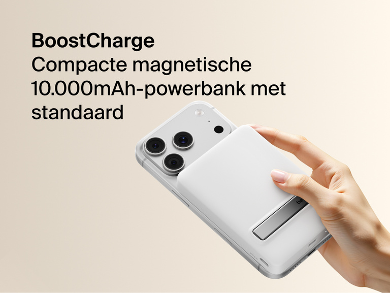 Slim Magnetic Power Bank 10K with Qi2 magnetically attached to smartphone showing integrated kickstand and handheld use