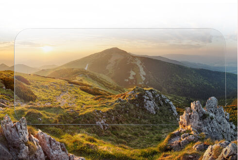 일몰 무렵의 아름다운 산 풍경 위에 투명 강화유리를 씌워 투명성을 강조했습니다.