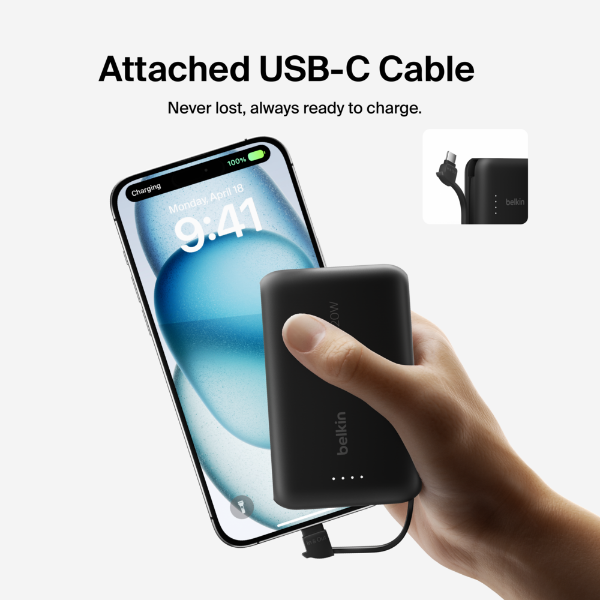 This image showcases a compact power bank with an attached USB-C cable being held in a person's hand while charging a smartphone. The phone displays the time as 9:41 and shows a full battery icon with "Charging" text, indicating active power delivery. The product emphasizes the convenience of the "Attached USB-C Cable" with the tagline "Never lost, always ready to charge." An inset detail highlights the built-in cable connection. The design is sleek and minimalistic, ideal for on-the-go charging.