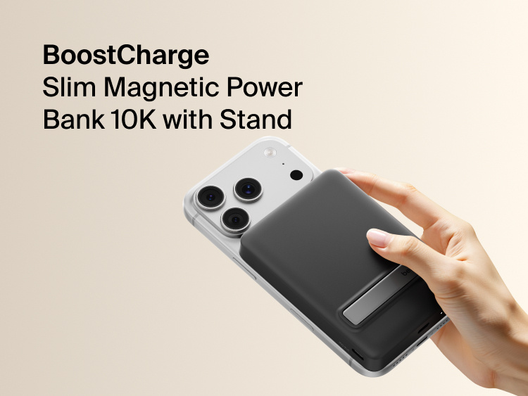 Slim Magnetic Power Bank 10K with Qi2 magnetically attached to smartphone showing integrated kickstand and handheld use