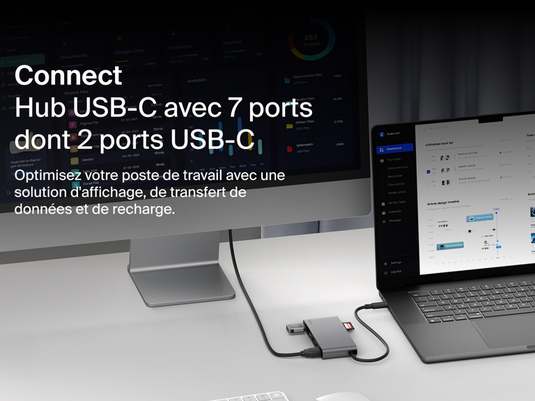 Belkin Connect 7-Port USB-C Hub with Dual USB-C Ports connected to a laptop and monitor on a desk setup.