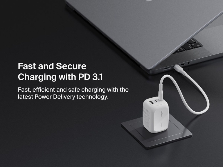 BoostCharge Pro 3-Port GaN Wall Charger 100W connected to a laptop, showcasing USB-C PD 3.1 technology for fast, efficient, and secure Power Delivery charging.