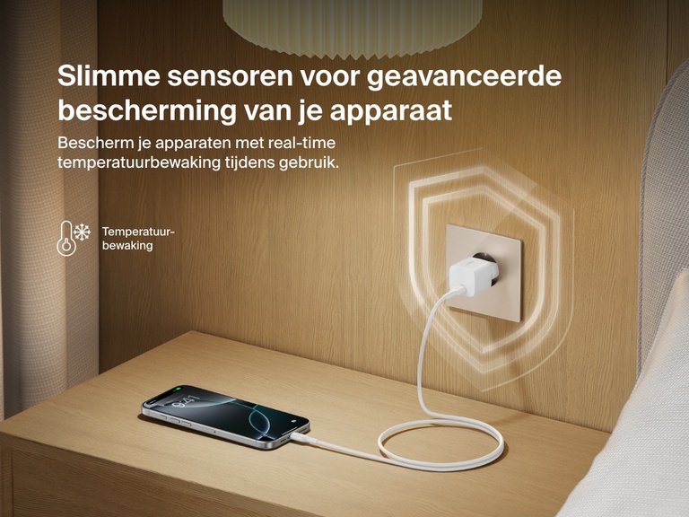 Belkin BoostCharge USB-C Wall Charger 25W plugged into a bedside outlet, showcasing real-time temperature monitoring for advanced device protection and safe charging.