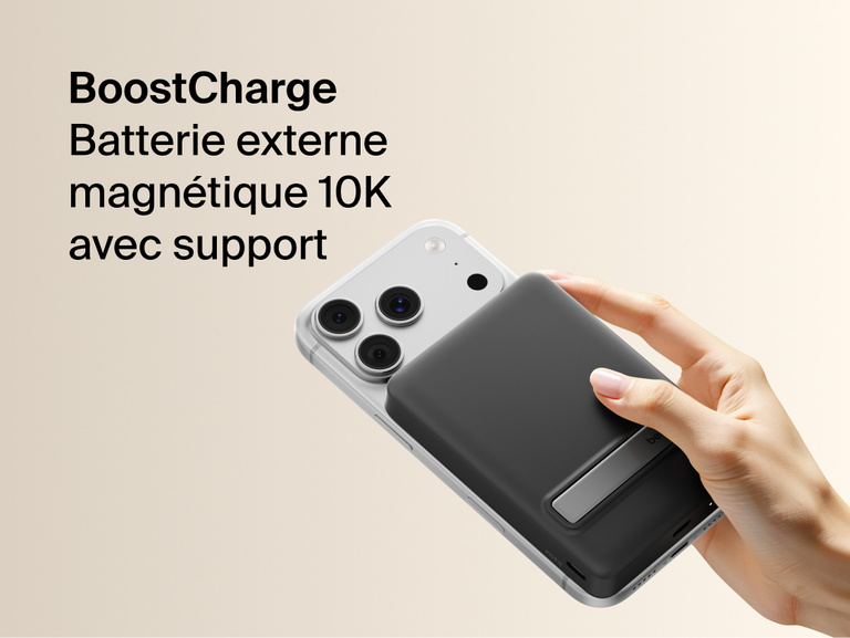 Slim Magnetic Power Bank 10K with Qi2 magnetically attached to smartphone showing integrated kickstand and handheld use