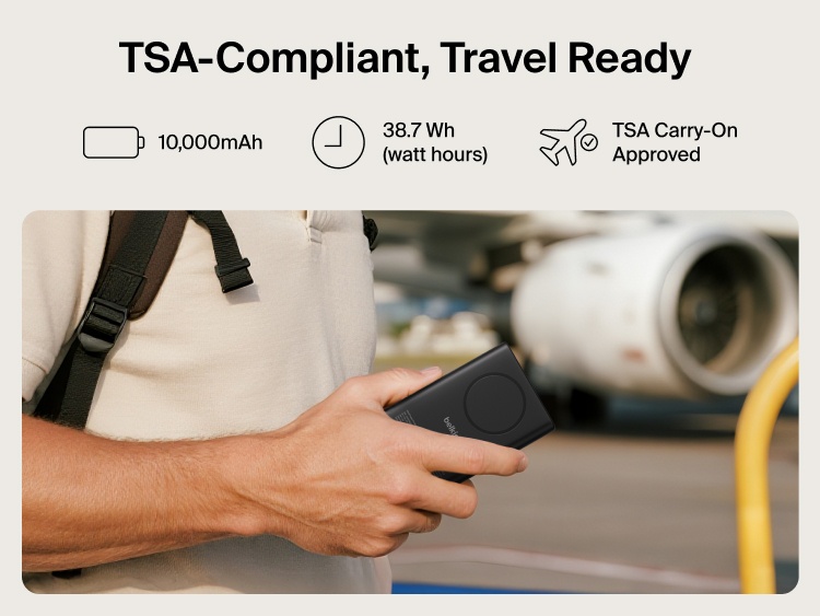 Belkin UltraCharge Pro Power Bank 10K with magnetic ring shown in hand at an airport, highlighting TSA-compliant 10,000 mAh capacity for travel-ready portable charging.