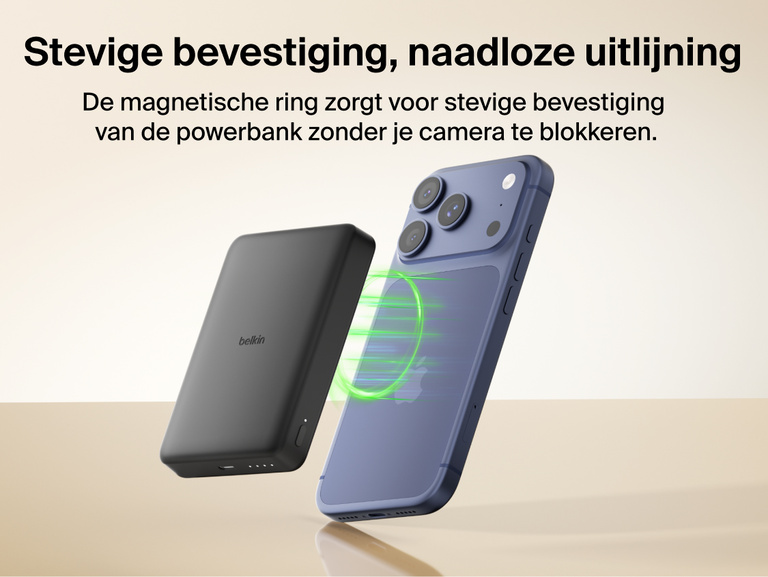 Belkin BoostCharge Slim Magnetic Power Bank 10K magnetically aligning to a smartphone for secure hold and wireless charging without blocking the camera