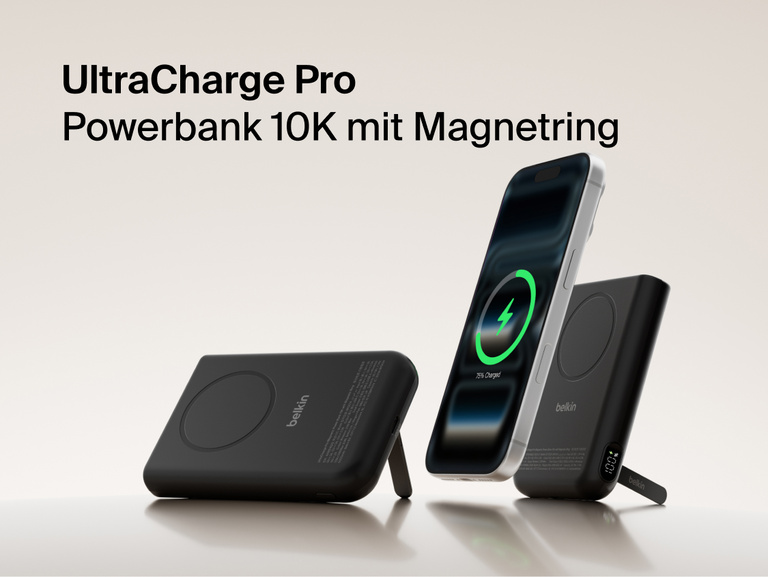 Belkin UltraCharge Pro Power Bank 10K with magnetic ring shown wirelessly charging a smartphone, featuring a slim portable battery design for on-the-go fast charging.