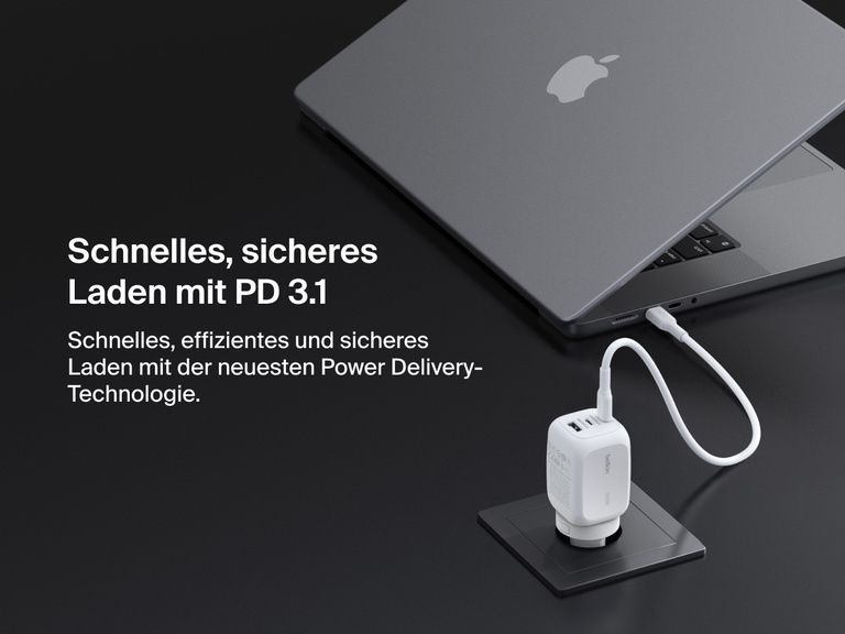 BoostCharge Pro 3-Port GaN Wall Charger 100W connected to a laptop, showcasing USB-C PD 3.1 technology for fast, efficient, and secure Power Delivery charging.