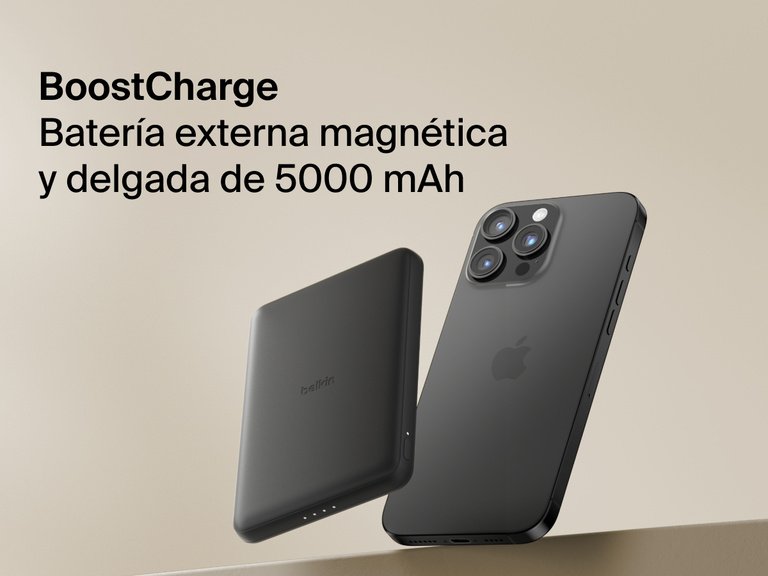 Belkin BoostCharge Slim Magnetic Power Bank 5K shown magnetically attached to a smartphone beside a slim wallet accessory, highlighting its compact portable charging design.