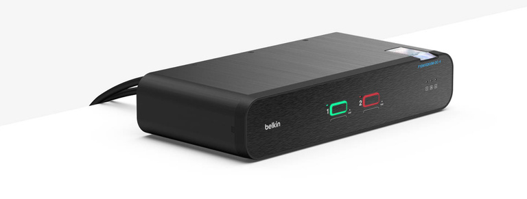 A sleek, black Belkin Universal DisplayPort Secure KVM 2-Port Single Head device, featuring illuminated port indicators and labeled buttons for secure switching between two computers.