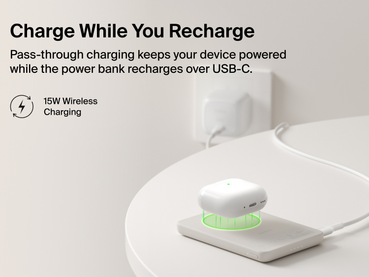 Belkin BoostCharge Slim Magnetic Power Bank 5K with Qi2 demonstrating pass-through charging, wirelessly powering a device while the power bank recharges via USB-C.