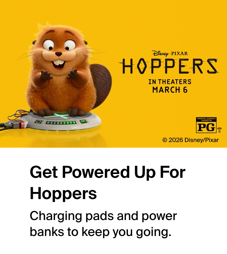 Animated beaver character standing excitedly on a glowing platform against a bright yellow background, with &lsquo;Disney&middot;Pixar Hoppers&rsquo; and &lsquo;In Theaters March 6&rsquo; text displayed.