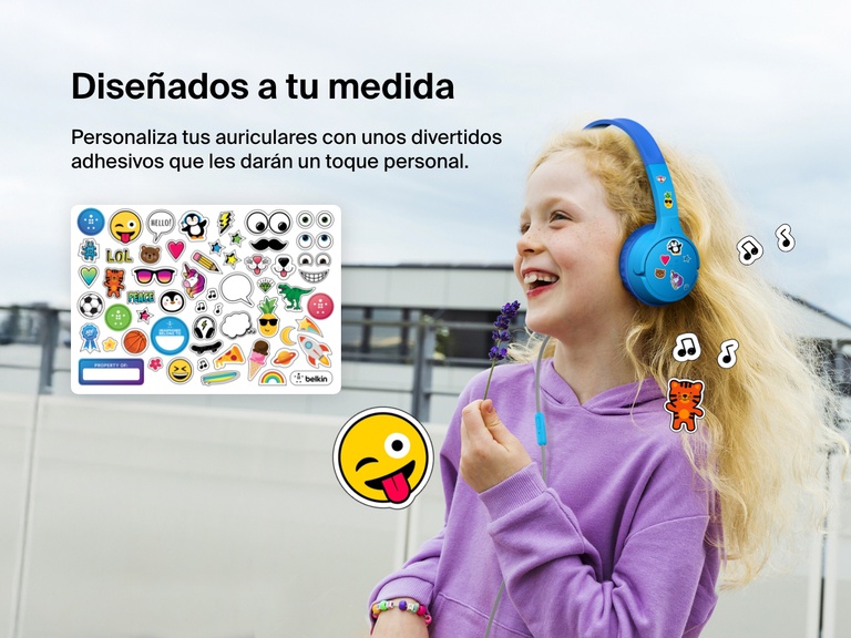 Smiling girl wearing Belkin Wired On-Ear Headphones for Kids decorated with colorful stickers, highlighting the headset’s personalization feature with included fun sticker sheet.