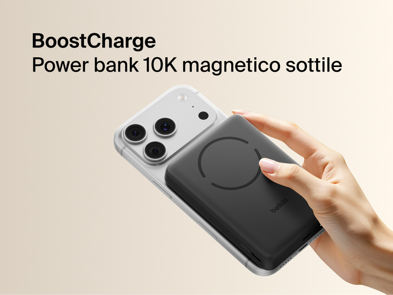 Slim Magnetic Power Bank 10K with Qi2 magnetically attached to smartphone held in hand demonstrating wireless charging alignment
