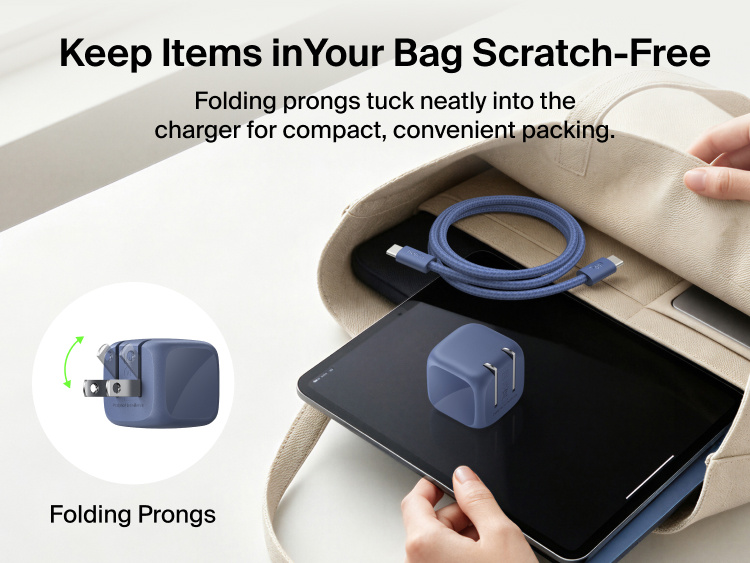 Belkin BoostCharge Compact USB-C Charger 30W with folding prongs and braided USB-C cable packed with a tablet in a bag for convenient travel.
