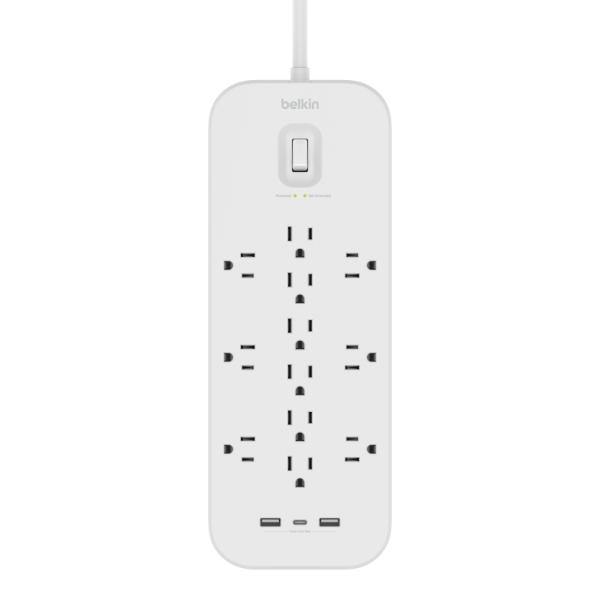 A white Belkin surge protector with twelve AC outlets, two USB-A ports, and two USB-C ports, featuring an on/off switch and LED indicators for protection and grounding status.
