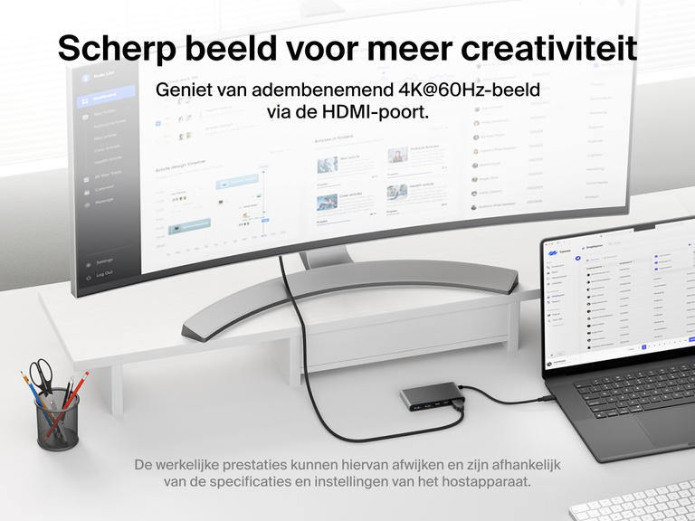 Belkin Connect 5-Port USB-C Hub with Dual USB-C Ports connects a laptop to a monitor, delivering stunning 4K@60Hz visuals via the dedicated HDMI port.