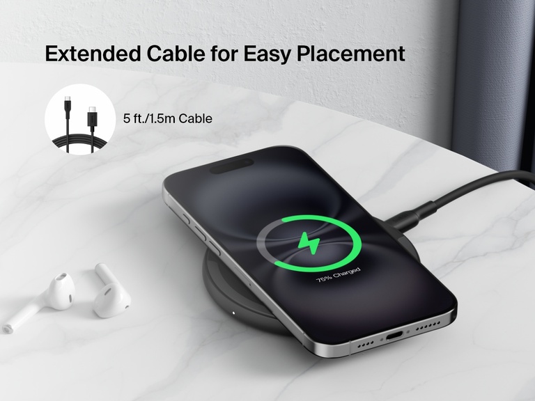 A black Belkin BoostCharge Wireless Charging Pad 15W is shown on a marble surface charging an iPhone, with text highlighting its extended 5 ft. (1.5m) cable for easy placement, alongside a pair of AirPods nearby.
