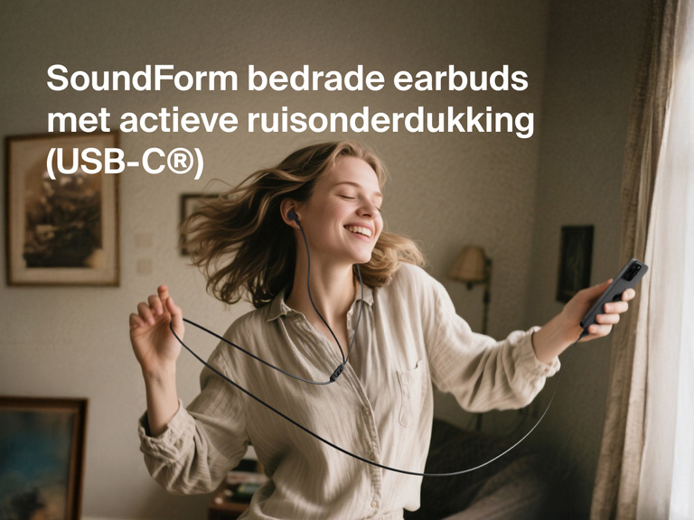 Belkin SoundForm ANC Wired Earbuds with USB-C® shown in use, delivering high-quality sound with active noise cancellation.