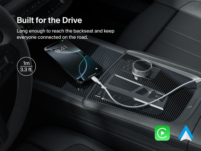 A 1-meter (3.3 ft) Belkin BoostCharge Pro Braided USB-A to USB-C Cable 15W charges a smartphone in a car, offering extended reach and seamless compatibility with Apple CarPlay and Android Auto.