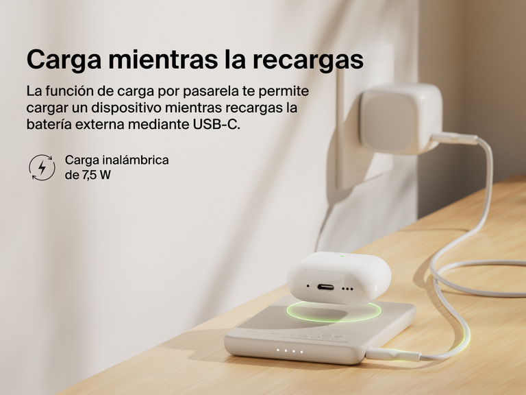 Belkin BoostCharge Slim Magnetic Power Bank 5K shown wirelessly charging earbuds while recharging via USB-C, demonstrating 7.5W pass-through charging functionality.