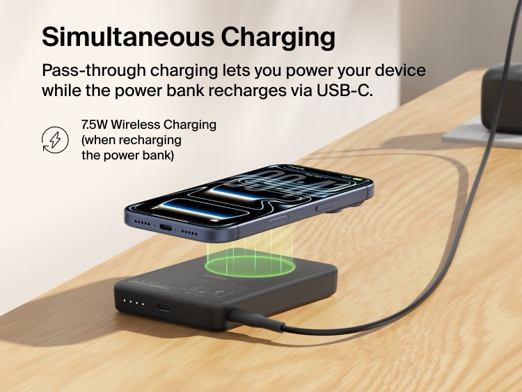 Belkin BoostCharge Slim Magnetic Power Bank 10K delivering pass-through charging with a smartphone wirelessly charging on top while the power bank recharges via USB-C cable