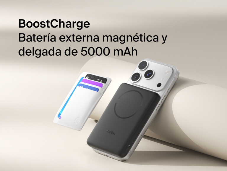 Belkin BoostCharge Slim Magnetic Power Bank 5K with Qi2 wirelessly attached to a smartphone, featuring a slim magnetic design with integrated card storage for portable on-the-go charging.