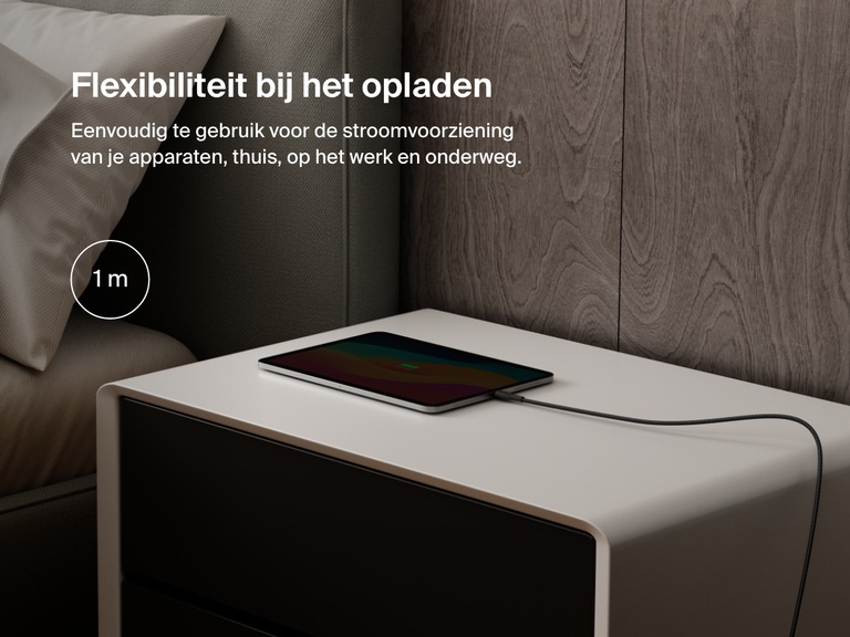 Belkin BoostCharge Pro USB-C to USB-C Braided Cable 240W shown charging a tablet on a nightstand, emphasizing its 1-meter (3.3 ft) length for convenient charging anywhere.