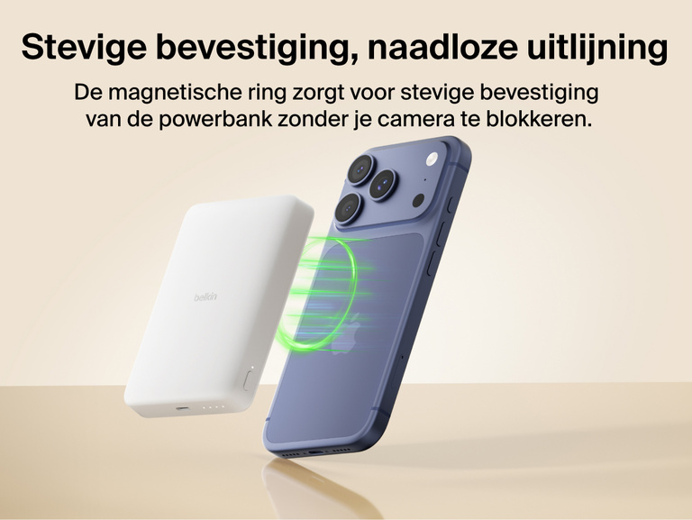 Belkin BoostCharge Slim Magnetic Power Bank 10K magnetically aligning to a smartphone for secure hold and wireless charging without blocking the camera