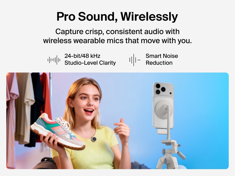 A young woman sits in a brightly lit room recording a video on a smartphone mounted on a tripod. She holds a colorful sneaker while wearing a small round wireless microphone clipped to her shirt. Text on the left reads &ldquo;Pro Sound, Wirelessly&rdquo; and highlights features such as 24-bit/48 kHz studio-level clarity and smart noise reduction.