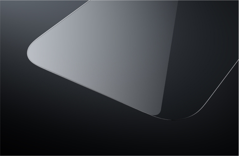 Close-up of a sleek, transparent screen protector with rounded edges, shown against a dark gradient background. Close-up of a sleek, transparent screen protector with rounded edges, shown against a dark gradient background.