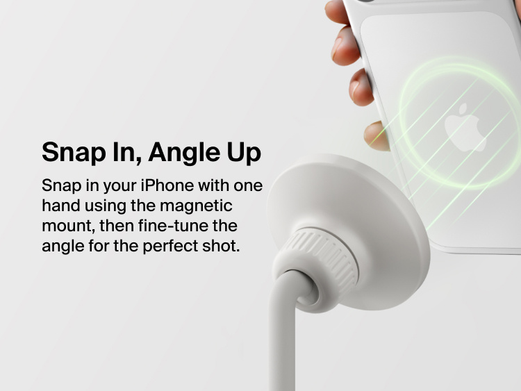 Image showing Belkin Stage Creator Kit magnetic mount attaching an iPhone with one hand, allowing easy snap-in setup and adjustable angles for optimal video recording.