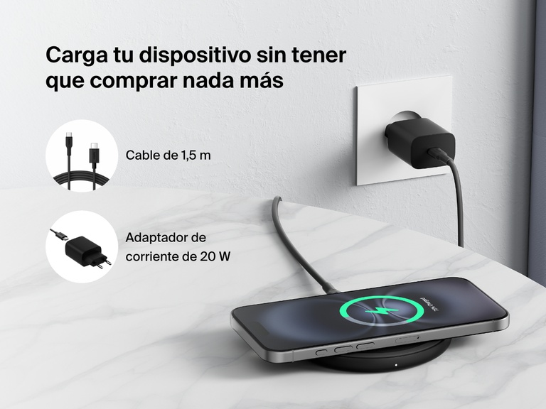 A black Belkin BoostCharge Wireless Charging Pad 15W is shown on a marble surface charging a smartphone, with text highlighting that it includes a 5 ft. (1.5m) cable and a 20W power adapter for easy setup right out of the box.