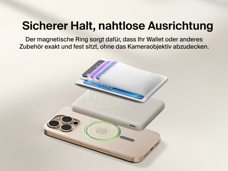 Belkin BoostCharge Slim Magnetic Power Bank 5K shown magnetically aligned between a smartphone and wallet accessory, demonstrating precise magnetic ring for secure attachment and camera-safe design.