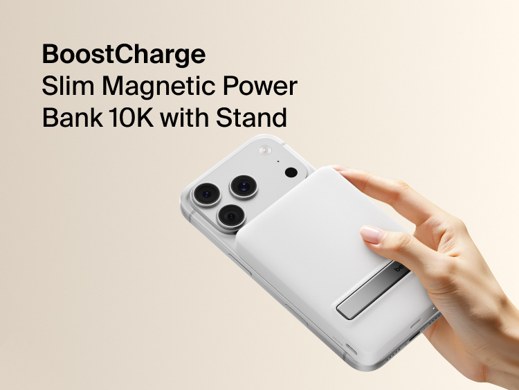 Slim Magnetic Power Bank 10K with Qi2 magnetically attached to smartphone showing integrated kickstand and handheld use