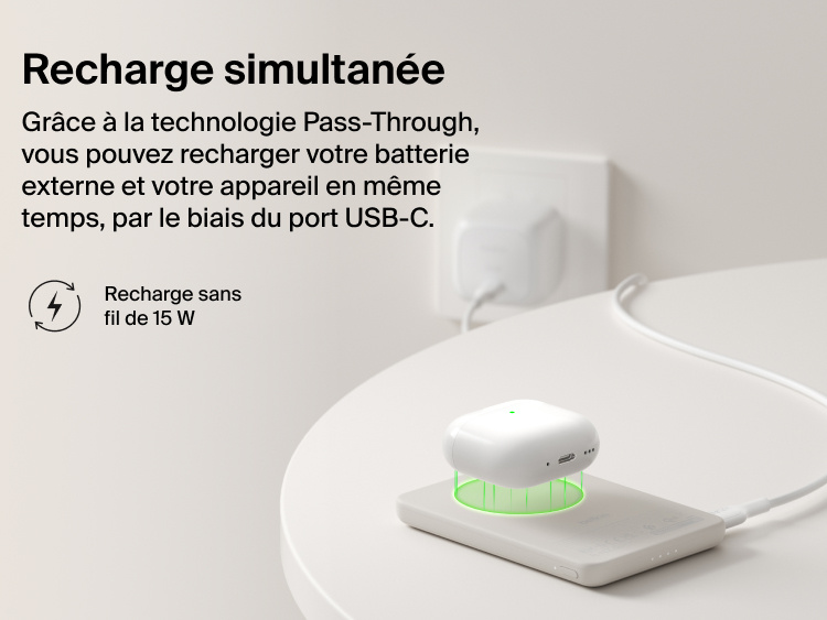 Belkin BoostCharge Slim Magnetic Power Bank 5K with Qi2 demonstrating pass-through charging, wirelessly powering a device while the power bank recharges via USB-C.