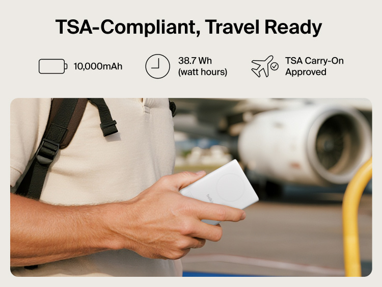 Belkin UltraCharge Pro Power Bank 10K with magnetic ring shown in hand at an airport, highlighting TSA-compliant 10,000 mAh capacity for travel-ready portable charging.