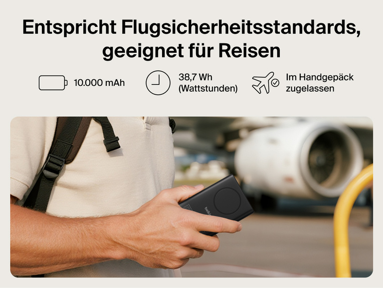 Belkin UltraCharge Pro Power Bank 10K with magnetic ring shown in hand at an airport, highlighting TSA-compliant 10,000 mAh capacity for travel-ready portable charging.
