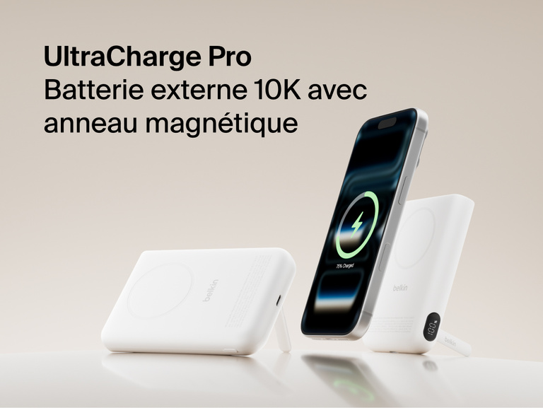 Belkin UltraCharge Pro Power Bank 10K with magnetic ring shown wirelessly charging a smartphone, featuring a slim portable battery design for on-the-go fast charging.
