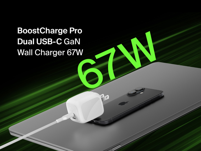 Belkin BoostCharge Pro Dual USB-C GaN Wall Charger 67W shown powering a device, highlighting fast, efficient charging performance.