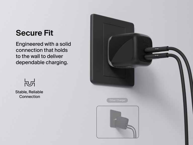 Belkin BoostCharge Pro Dual USB-C GaN Wall Charger 67W shown plugged into an outlet, demonstrating a secure, stable connection for reliable wall charging performance.