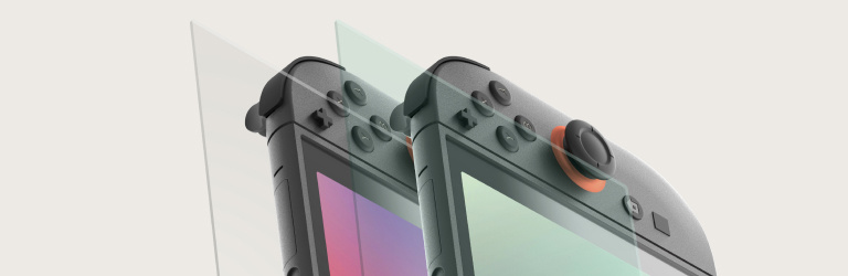 Close-up of a Nintendo Switch 2 console with two transparent screen protectors aligned above the screen, illustrating layered protection. The background is a clean, light beige, emphasizing the clarity and precision fit of the screen protectors.