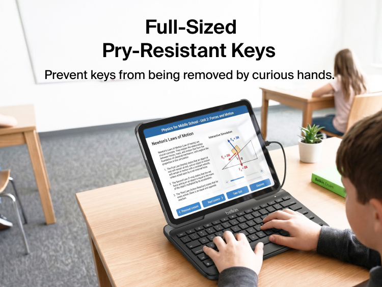 Connect USB-C Keyboard with Stand for iPad in use at a desk, with a student's hands typing on the full-sized keyboard and an educational lesson displayed on the iPad screen