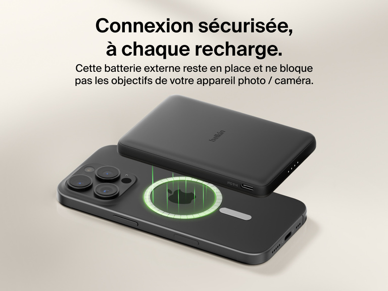Belkin BoostCharge Slim Magnetic Power Bank 5K shown magnetically aligned between a smartphone and wallet accessory, demonstrating precise magnetic ring for secure attachment and camera-safe design.