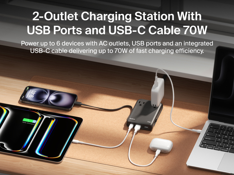 Belkin 2-Outlet Charging Station with USB ports and integrated USB-C cable 70W powering a laptop, smartphone, and multiple devices on a desk.
