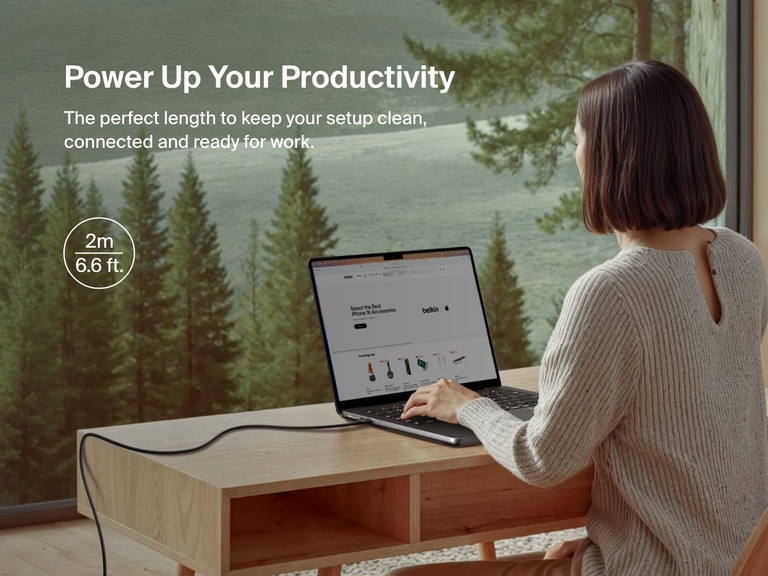 Belkin BoostCharge Pro Braided USB-C to USB-C Cable 60W in 2m (6.6ft) length shown connecting a laptop in a serene home office setup, offering extended reach for an organized and productive workspace.